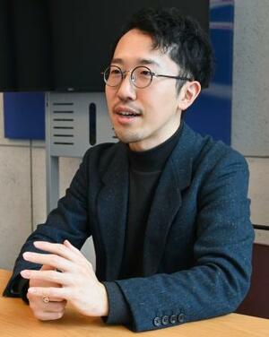 　取材に応じるＡＩガバナンス協会の佐久間弘明理事