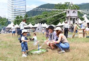 フジロックフェスティバルを前に開かれたイベント=19日、湯沢町三国