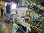 自動で土入れから播種まで行う苗作り=4月4日、新潟市西蒲区