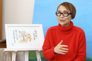 インタビューに応じるちゃい文々さん=新潟市西区