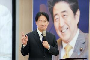 国立政治大の安倍晋三研究センター設立大会であいさつする台湾の頼清徳総統=21日、台北(共同)