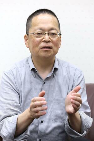 新潟国際情報大学の越智敏夫学長