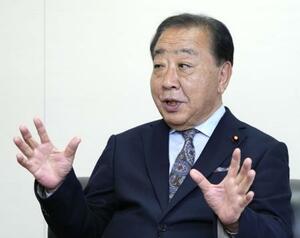 インタビューに答える立憲民主党の野田代表=25日午後、東京・永田町の党本部