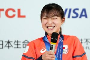 銀メダル獲得から一夜明け、記者会見するフィギュアスケート女子の坂本花織=20日、イタリア・ミラノ(共同)