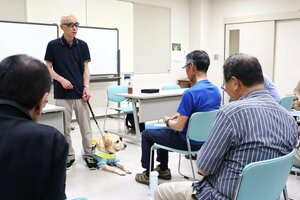 視覚障害のある男性が中越沖地震の被災体験を語った講演会=柏崎市豊町3