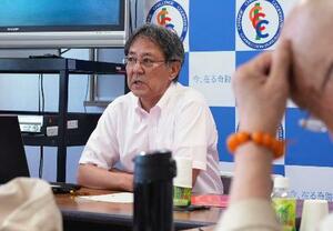 多摩少年院で東ティモールの刑務所視察について報告する矯正研修所の池田一矯正研修分析官=30日午後、東京都八王子市