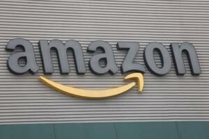 米アマゾン・コムのロゴ=2023年12月(ロイター=共同)