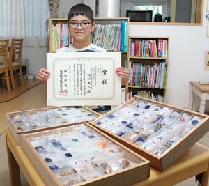「自然科学観察コンクール」の小学校の部で1等賞を受賞した春日新田小6年の樋口葵人さん=上越市福田