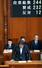 　参院本会議で郵政民営化法などの改正法が可決、成立し一礼する林総務相＝１９日午後