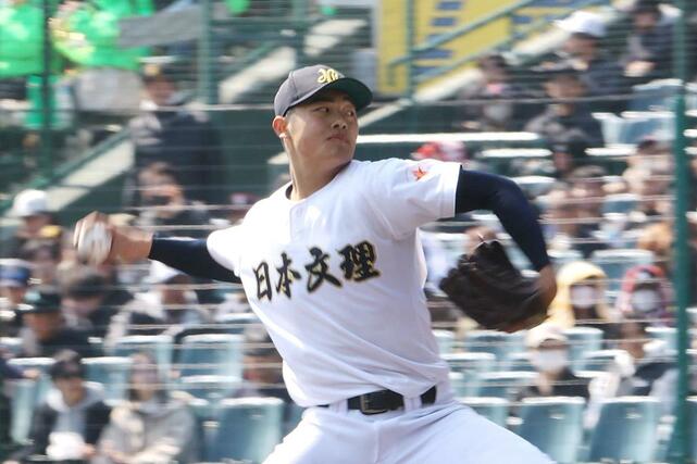 高知農－日本文理　７回１失点と好投した、日本文理のエース染谷崇史＝２１日、阪神甲子園球場