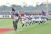 第107回全国高校野球選手権新潟大会が開幕。入場行進する昨夏優勝の新潟産大付=エコスタ