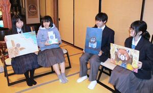 会場の正福寺で五泉ひゃんでアート展をＰＲする五泉特別支援学校、村松分校、村松高校の生徒ら＝五泉市村松甲