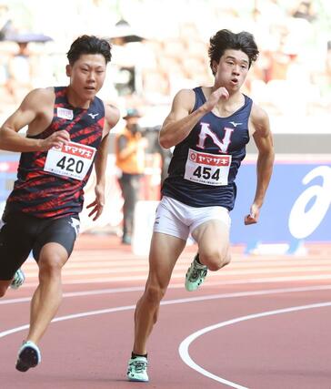 男子２００メートル予選　出場した木村峻也（右）＝国立競技場