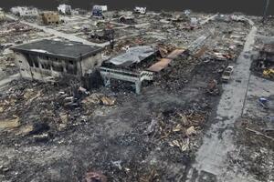 　東日本大震災で津波火災の被害を受けた岩手県山田町のＪＲ陸中山田駅（中央）周辺の３Ｄ画像から。道路の黒く焦げて見える部分が火の通り道になっていたとみられる。２０１１年３月２３日に撮影した航空写真を基に、共同通信が一橋大の谷田川達也准教授と協力して作成した