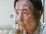 硫黄島での子ども時代を語る森下佳代子さん=7月、東京都八丈町