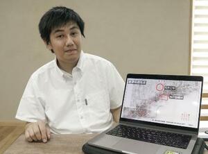 「模擬原爆」について独自研究を進めている神戸大学院生の西岡孔貴さん=神戸市