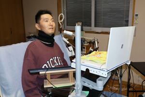 「働く姿を見せてお世話になった人に恩返ししたい」と話す佐藤一幸さん=胎内市