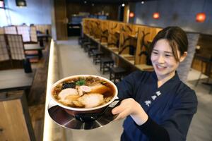 「荻川」「新津」など秋葉区の地名のメニューを提供する「麺屋 米」=新潟市秋葉区車場4