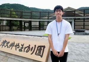 「津久井やまゆり園」がある千木良地区出身の新人職員谷口賢史さん=6月、相模原市