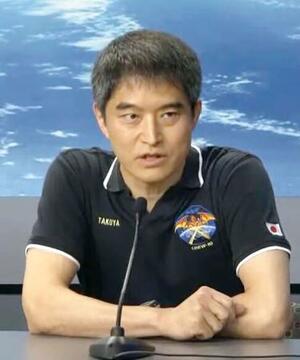 ジョンソン宇宙センターで記者会見する大西卓哉飛行士=20日、米テキサス州(NASAの中継から・共同)