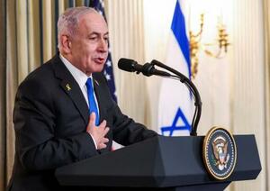 トランプ米大統領との会談後、共同記者会見するイスラエルのネタニヤフ首相=29日、ワシントン(ロイター=共同)