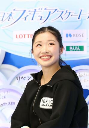 得点を確認し笑顔を見せる中井亜美＝国立代々木競技場