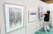 県展佐渡展の展示作業が進む会場=17日、佐渡市窪田