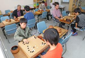 熱戦を繰り広げた初段獲得戦=新潟市中央区東大通1