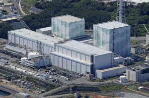東京電力福島第1原発の5号機(左)、6号機=2023年8月(共同通信社ヘリから)