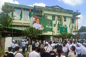 28日、ミャンマー最大都市ヤンゴンに開設された連邦団結発展党(USDP)の選挙事務所(共同)