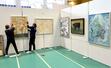 県展佐渡展の展示作業が進む会場=17日、佐渡市窪田