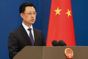 　記者会見する中国外務省の郭嘉昆副報道局長＝１５日、北京（共同）